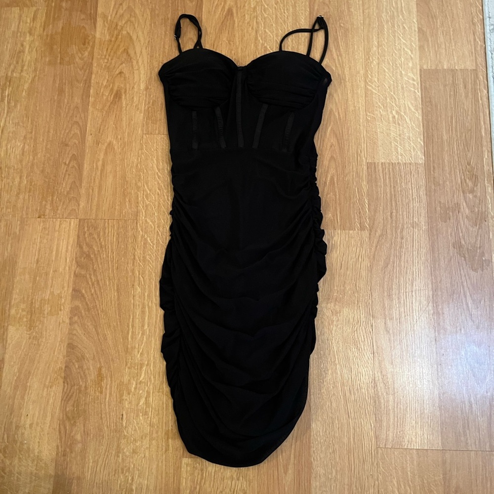 Formal black mini dress, corset like top half, light delicate material
